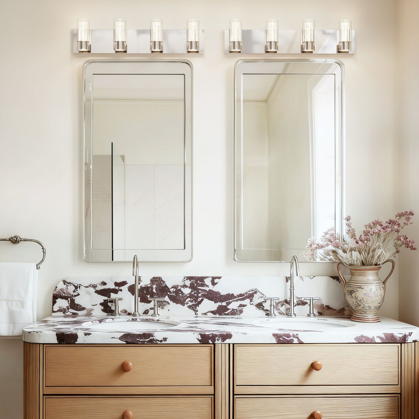 Chrome Alice 4-light LED bathroom vanity light over a double vanity